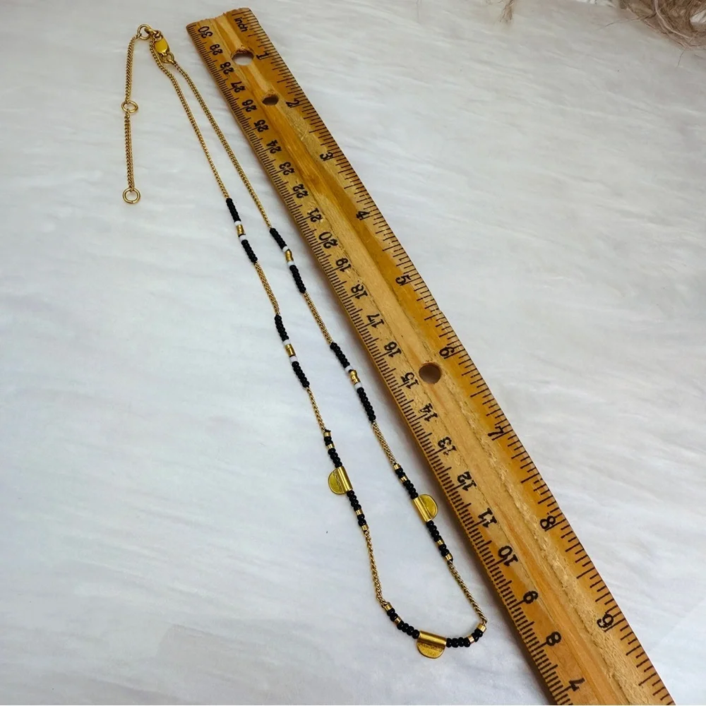Delicate goldtone, black beaded minimalist necklace
